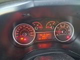 a close up of a car dashboard with various gauges