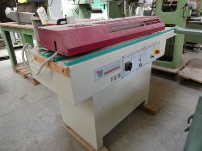a machine that is sitting on a table in a factory