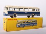 a toy bus that is sitting on top of a box