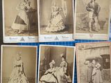 six antique photographs of women in dresses and hats are on a table