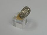 an image of a silver ring on a clear stand on a white surface