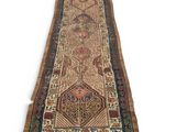 a long rug with a design on the bottom of it