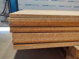 a stack of plywood boards stacked on top of each other