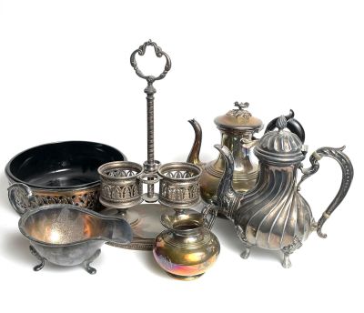 a lot of silver items that are on the table