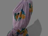 an image of a mannequin wearing a purple top with flowers on it