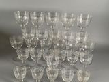 a lot of empty wine glasses sitting on a table