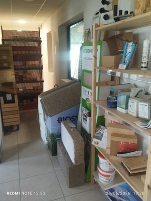 a room with a lot of boxes and boxes on the shelves