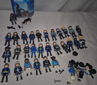 a lot of action figures that are on the table