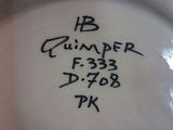 a close up of a white plate with writing on it