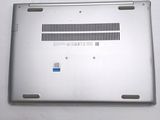 an open laptop computer sitting on top of a white table