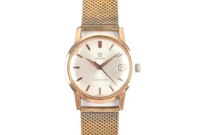a close up of a watch on a white background