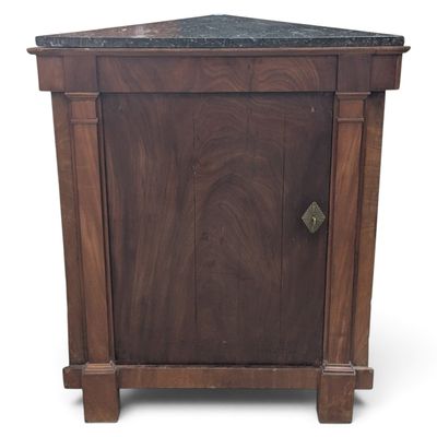 an image of a wooden cabinet with a marble top