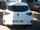 a white car that is parked in a parking lot