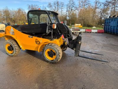 a close up of a forklift parked in a parking lot