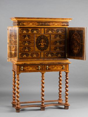 an old wooden cabinet with a door open on a gray background
