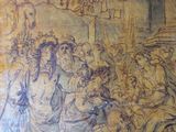 a drawing of a group of people on a wall