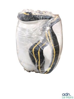 a plastic bag with a pair of shoes inside of it