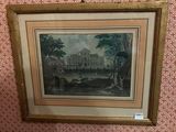 framed picture of a painting of a house on a red and white wall