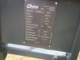 a close up of a sign on the side of a metal structure