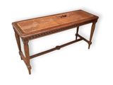 an image of a wooden table with a rattan top