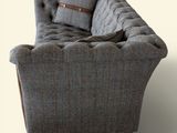 an image of a chair with a pillow on top of it