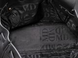 the inside of a black purse with a zipper on it