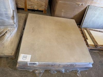 a table that is sitting in the middle of a pile of boxes