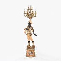 Nubien porte-torchère en bois sculpté polychrome souligné d'…