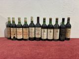 a group of bottles of wine sitting on top of a table