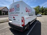 a van that is parked in a parking lot
