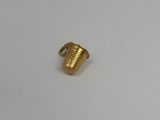 a close up of a gold plated object on a white surface