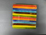 a multicolored box sitting on top of a table