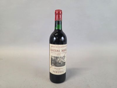a close up of a bottle of wine on a table