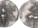 a close up of a coin with an image of a man on it