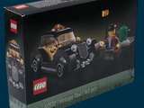 a box of legos with a toy car in it
