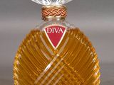 a bottle of diya perfume sitting on a table