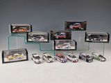a lot of different model cars in a display case