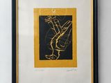 a black and gold framed picture of a plant with a yellow border