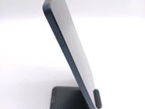 a close up of a cell phone on a stand