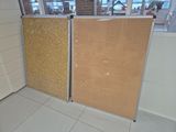 two doors that are open in the corner of a room