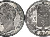 une pièce d'argent avec une couronne au recto et une couronne au verso