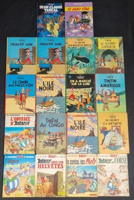 many children ' s books are lined up on a black surface
