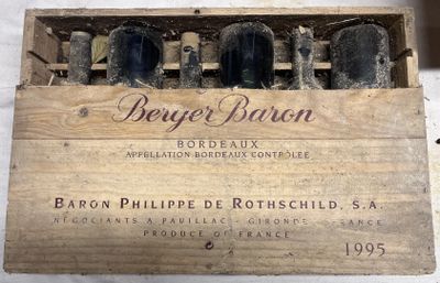 a wooden box with six bottles of wine in it