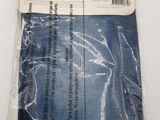 a close up of a pair of blue jeans wrapped in plastic