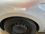 a picture of a car with a sticker on the side of it