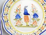 a plate with a picture of a man on it