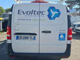 a van that is parked in the parking lot