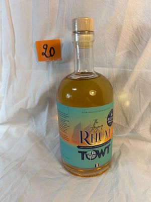 a bottle of rum that is sitting on a table