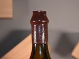 a bottle of wine that is sitting on a table