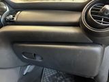 a close up of a car ' s dashboard with the air vents open